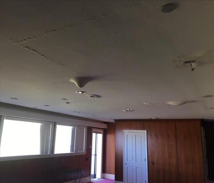 Roof leak caused severe damages inside a residence