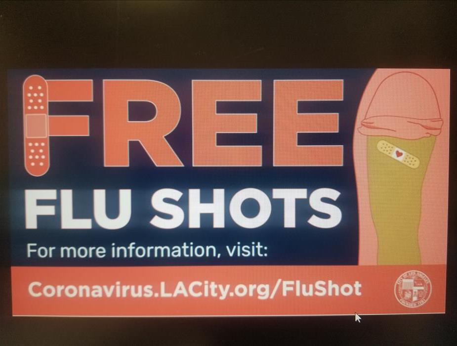 Flu Shots Are Free!! Animated flu image.